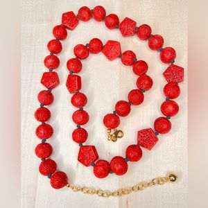 Joan Rivers faux cinnabar  carved long necklace